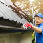 How to Safely Clean Gutters Using a Ladder